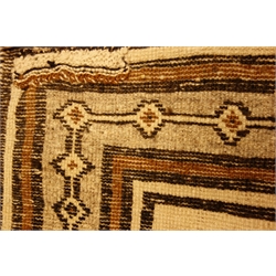  Two ceream ground Bakhtiari rugs, joined lozenge medallions with geometric borders, 215cm c 134cm max (2)  