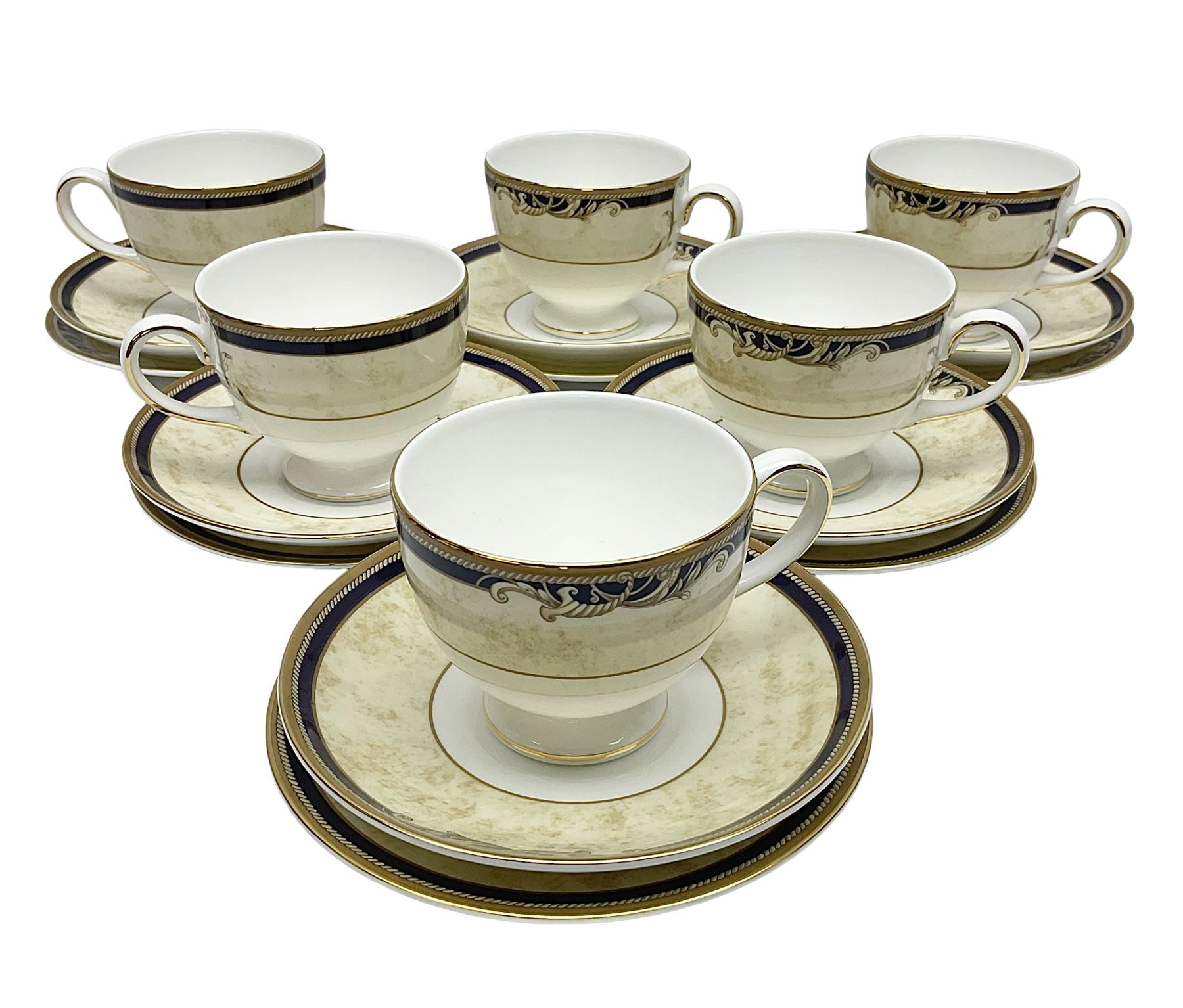 Wedgwood Cornucopia pattern tea service for six, comprising dessert plates, teacups and saucers (18)