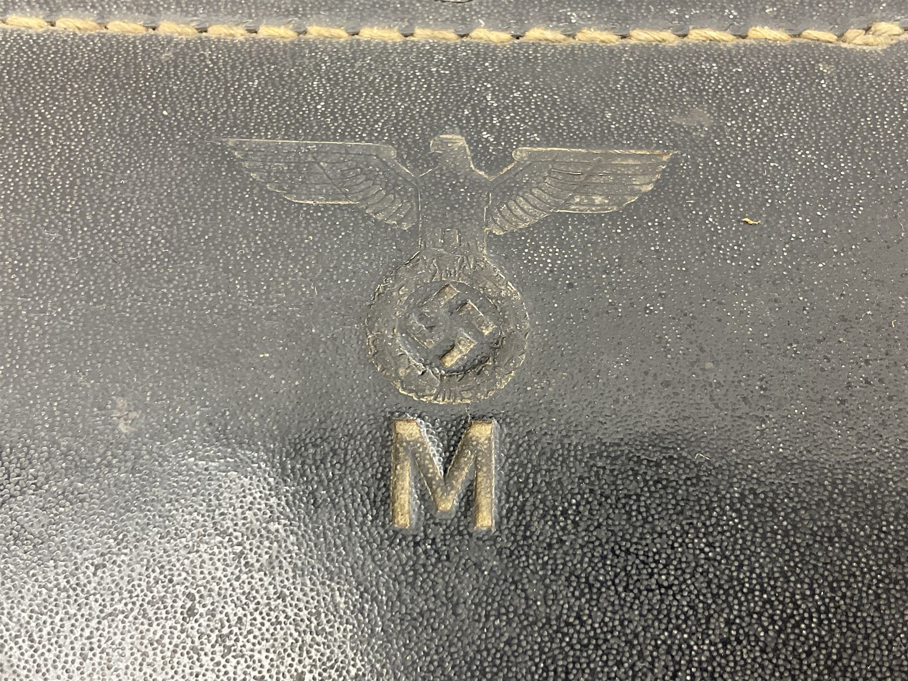 Pair of WWII German U-boat binoculars probably 7 x 50 by Leitz, with rubber eye piece protector covers and leather case stamped with Kriegsmarine mark to the lid and dated 1944, with leather strap.