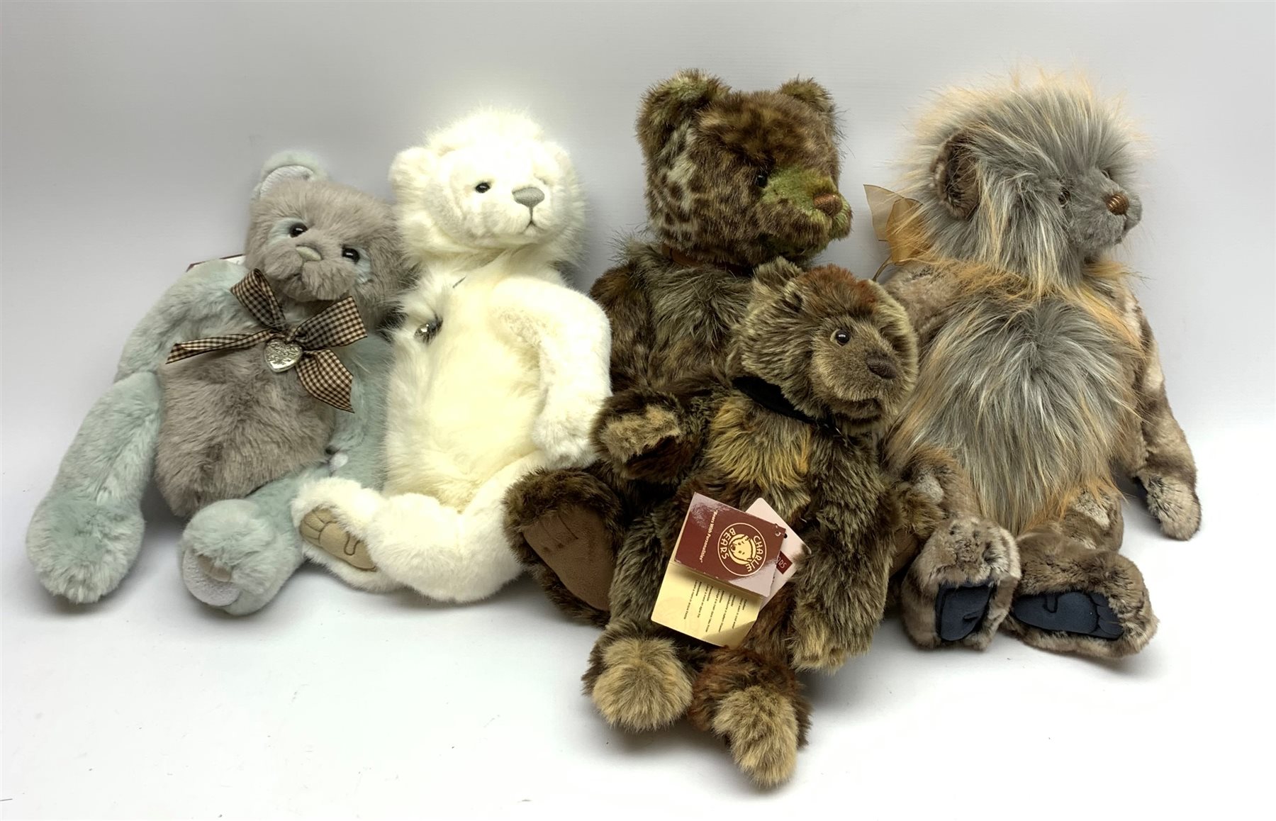 A group of Five Charlie Bears, designed by Isabelle Lee, comprising Mr Twitcher, Trudy, Shelby, Chillblaine, and Birthday Wojtek. 