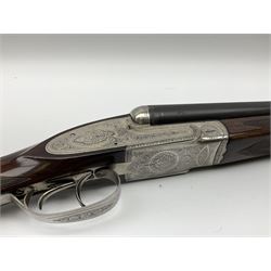 Gunmark Silver Sabel De Luxe 12-bore side by side double barrel side lock ejector sporting gun, 68.5cm barrels with 2.75cm chambers and matt bluing, walnut stock with chequered grip and fore-end and thumb safety, serial nos.12509 & 100.085, L111.5cm overall SHOTGUN CERTIFICATE REQUIRED