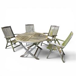 Five piece teak garden dining set, comprising circular folding table and four folding armc...