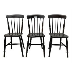 Set of three Victorian lacquered elm and beech farmhouse dining chairs, stick back over shaped saddle seat, raised on ring turned supports with H-stretcher