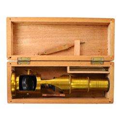 Late 19th/early 20th century Negretti and Zambra London brass microscope, with lenses, in mahogany travel case, together with a small brass field microscope and a set of prepared specimen slides