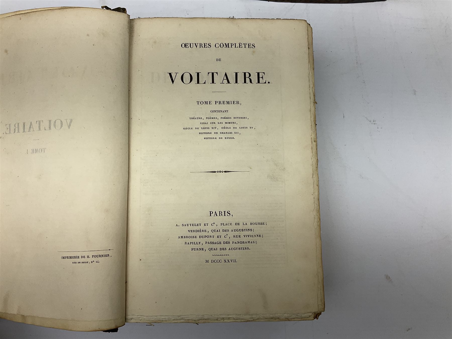 Eighteen 19th century leather bound books including Oeuvres Completes De Voltaire. 1827 Paris. Two volumes; Oeuvres De Pierre Corneille. 1892 Paris; Commentarium in Librum Geneseos Scripsit Thomas Josephus Lamy. 1883 Mechliniae; etc (18)