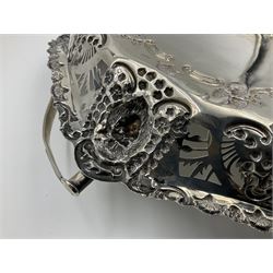 Edwardian silver swing handled basket, of navette form, with four repousse lion masks to each corner and with pierced and embossed floral, scroll and shell decoration to sides, base and handle, hallmarked Charles Horner, Birmingham 1906, height including handle H20cm