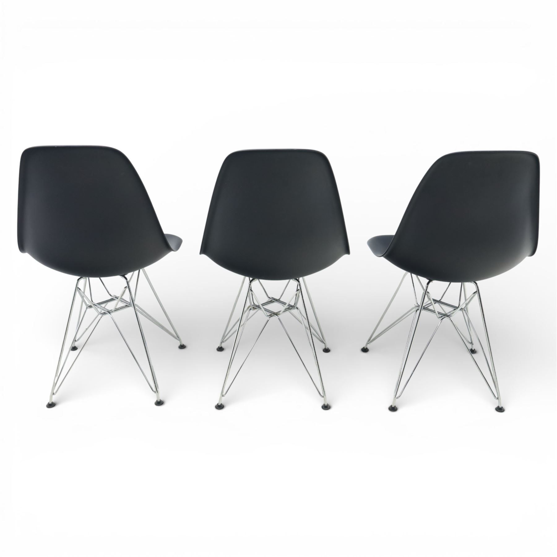 Vitra - set of six DSR side chairs designed by Charles and Ray Eames, moulded black plastic seats, raised on chromed wire Eiffel bases with plastic foot glides