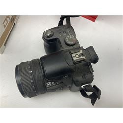 Minolta Dynax 5xi camera body serial no 17222646 with 'AF Zoom Xi 28-80mm 1:4(22)-56' lens serial no 17220881, Minolta SRT101 camera body serial 1944687, Lumix camera body serial no K6SC10168 etc 