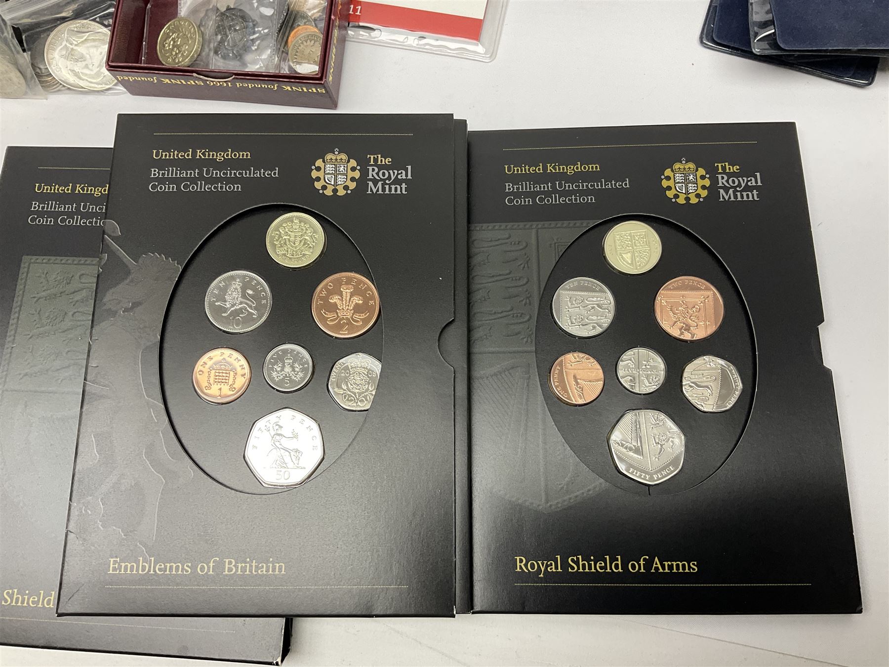 Commemorative and other coinage, including various Queen Elizabeth II 'London 2012 sports collection' fifty pence coins on cards, commemorative crowns, Millennium 2000 'Time Capsule' coin set, channel islands old round one pound coins, part sets etc