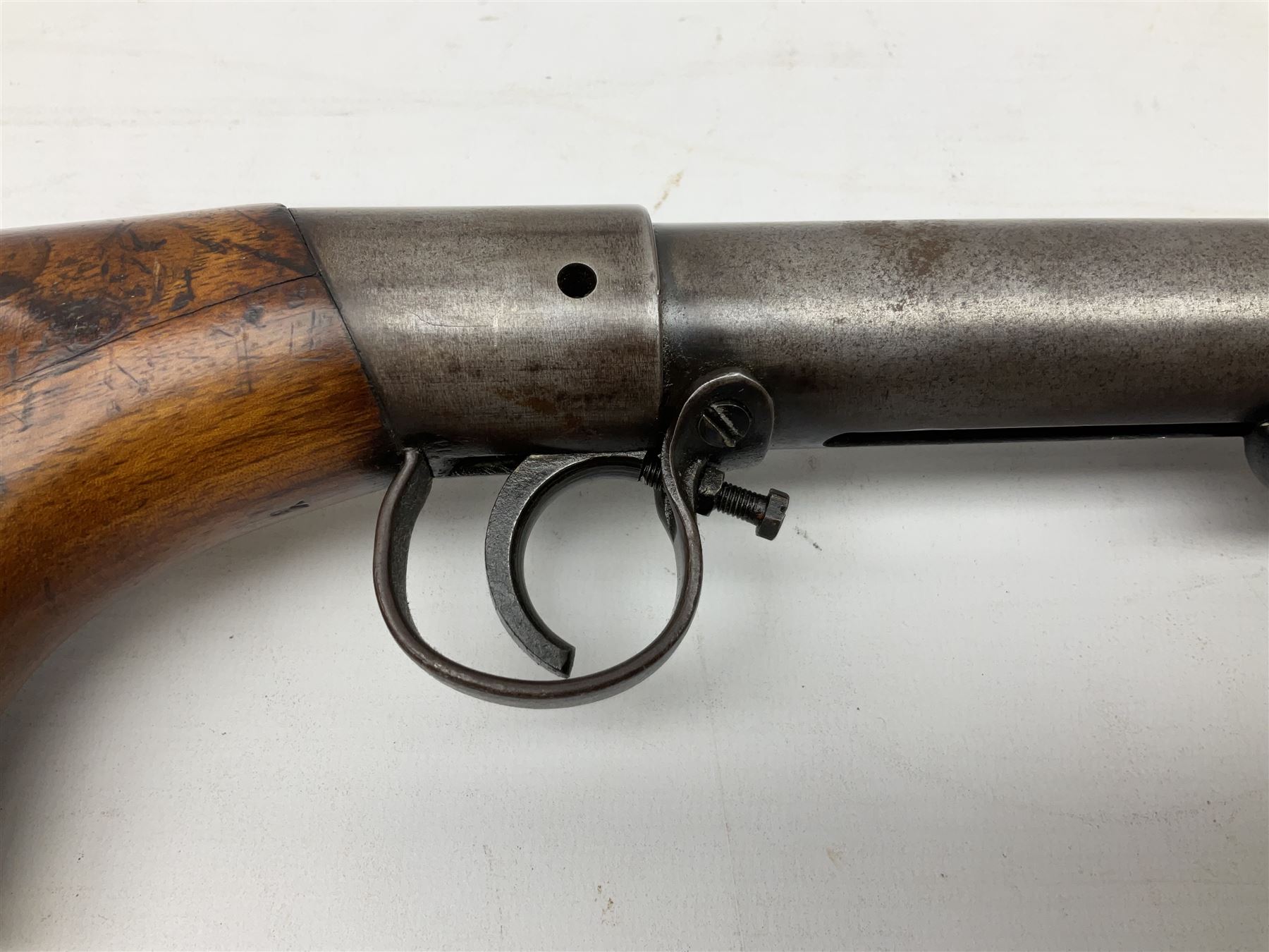 BSA .177 air rifle with top loading under lever action, walnut stock carved with chequered BSA logo to grip, serial no.A1203 L102cm