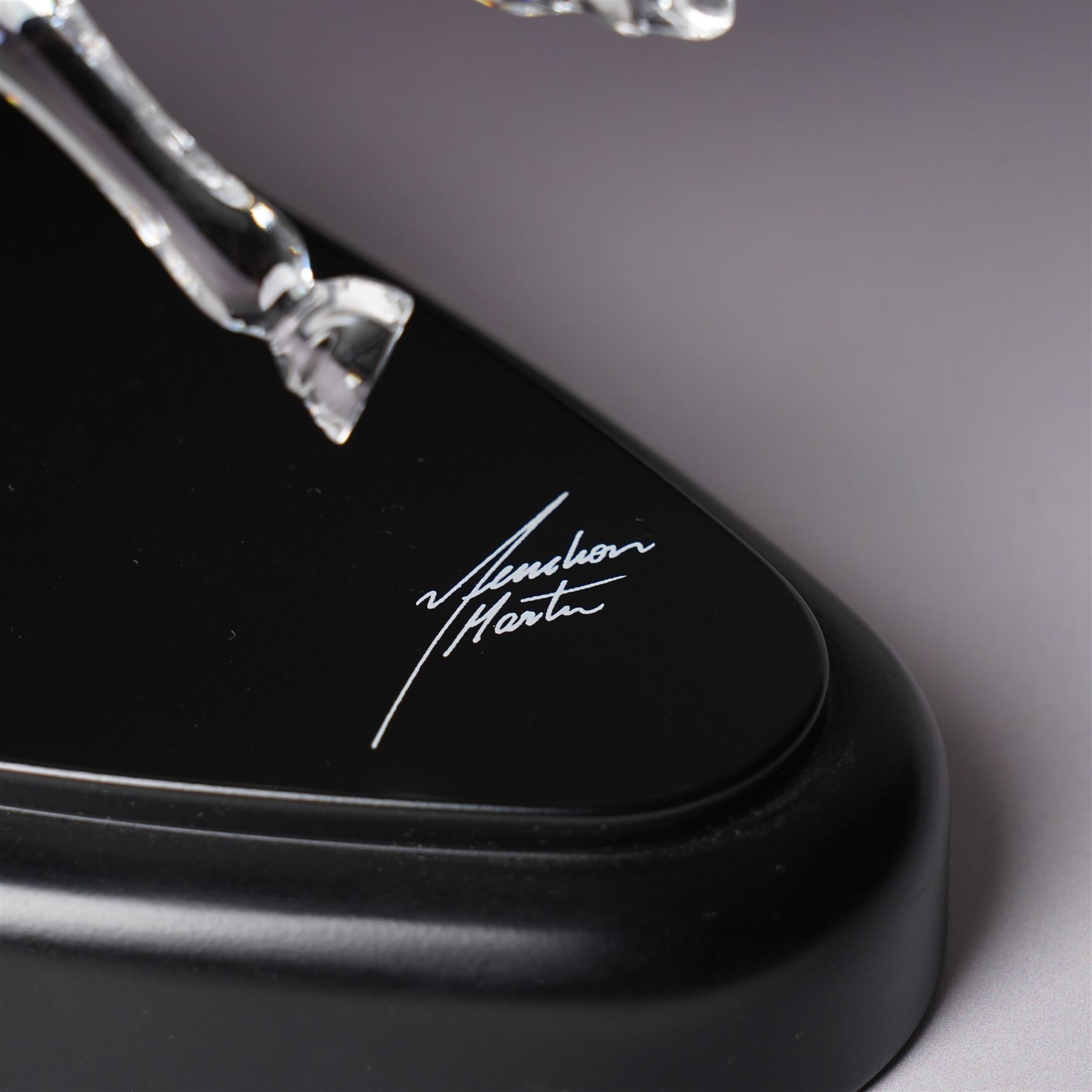 Swarovski, Wild Horses, modelled as two galloping horses upon a wooden plinth, limited edition 3915/10000, with certificate and case, H20cm