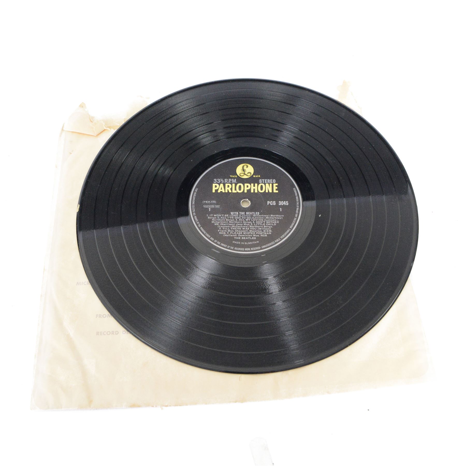 The Beatles 'With The Beatles' vinyl LP, UK Stereo Original, Parlophone PCS 3045, together with two Beatles 7