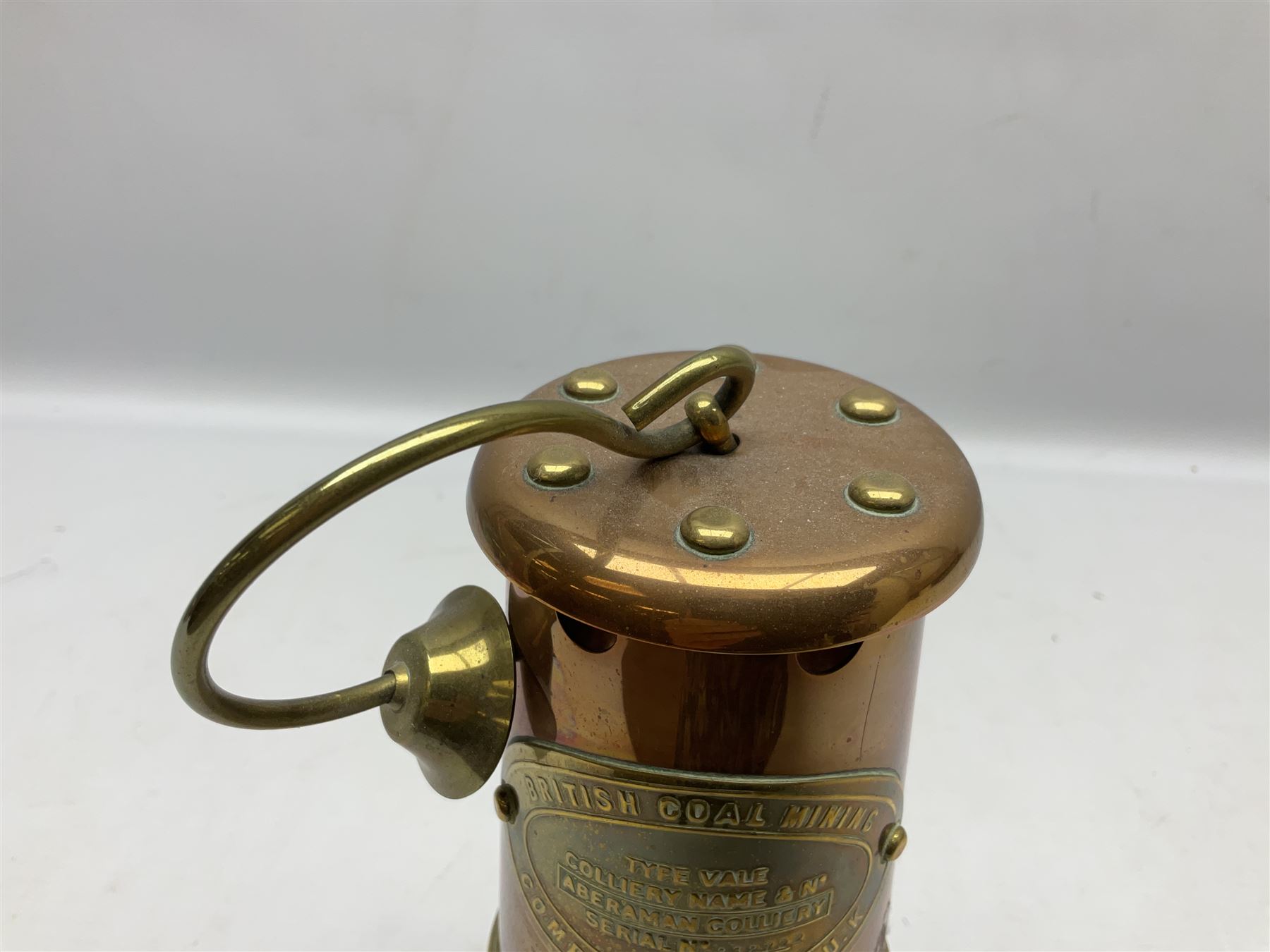 Copper and brass miners lamp by British Coal Company Wales UK for Aberaman Colliery Serial No. 232722, H22cm excl handle