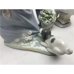 Six Lladro figures, comprising Naughty Dog no 4982, Best Friend 7620 and My Buddy no 7609, Kitty Confrontation no 1442, It Wasn't Me no 7672 and Rabbit Eating no 4772, three with original boxes, largest example H22cm