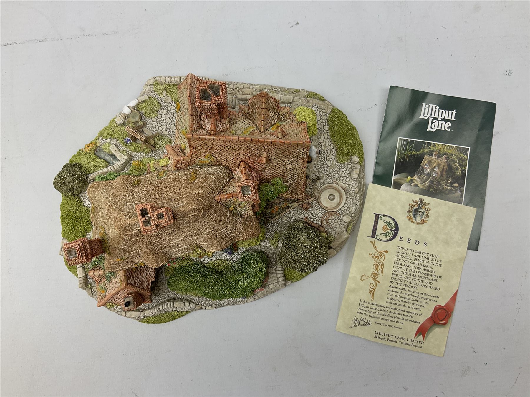 Two limited edition Lilliput Lane cottages, comprising Oakwood Smithy and Blair Athol, both boxed with deeds