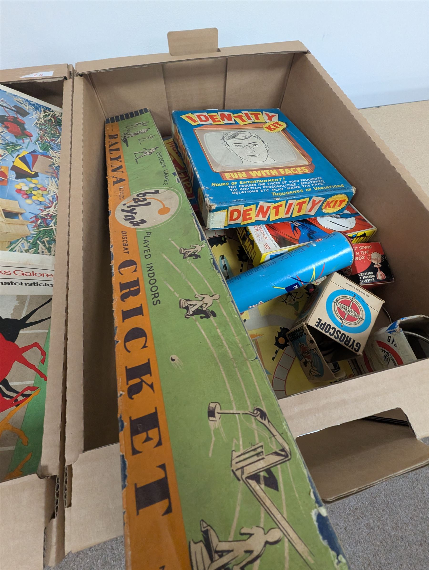 Collection of boxed vintage board games, including Balyna Cricket, Identity Kit, Gyroscopes, Waddingtons Scoop, etc