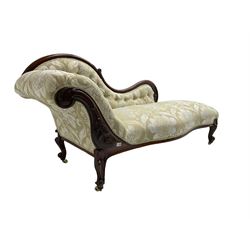 Victorian mahogany chaise longue, scrolled back with pierced and floral carved decoration, champagne foliate pattern fabric, cabriole feet with brass and ceramic castors