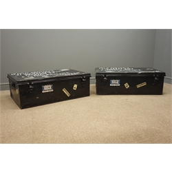  Pair 'Uandi' steel travelling trunks, black painted finish, (W92cm, H31cm, D60cm), with two wall hanging rugs depicting African and wild bear scene.  
