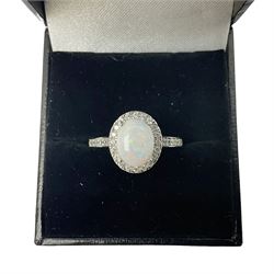 Silver opal and cubic zirconia cluster ring, stamped 925, boxed