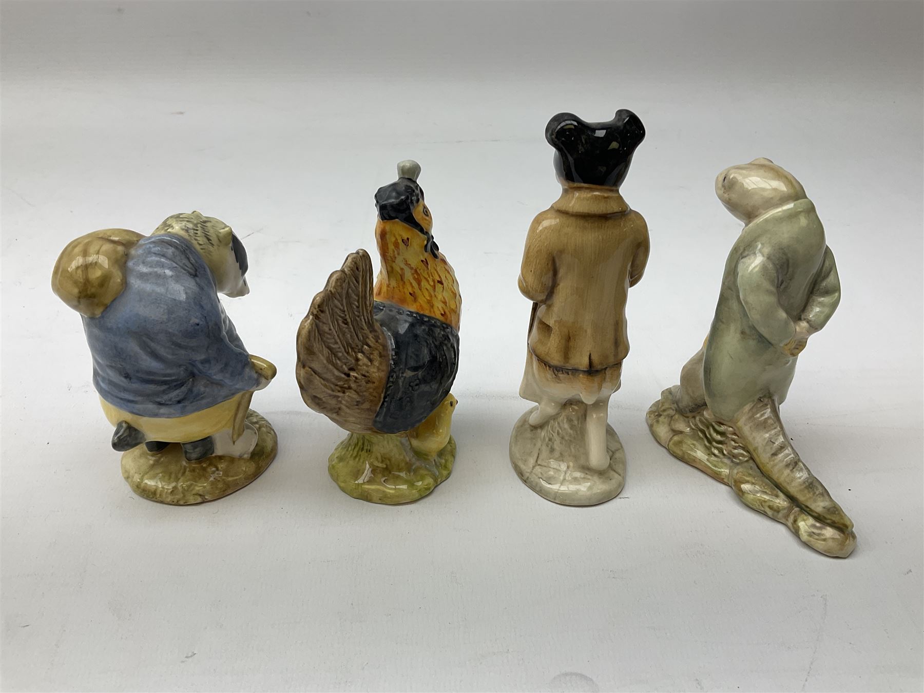 Seven Beswick Beatrix Potter figures, comprising Sir Isaac Newton, Mr Jackson, Tommy Brock, Pickles, Mr Jeremy Fisher, Mr Alderman Ptolemy and Sally Henny Penny, all with printed mark beneath  