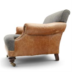 Tetrad - 'Taransay' Harris Tweed and tan leather club armchair, Howard shape with reclined back over deep seat and rolled arms with studwork, raised on turned front supports with castors, the sides and arms upholstered in tan leather with seat and back in herringbone-stitched Harris Tweed