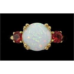 Silver-gilt three stone opal and garnet ring, stamped 925