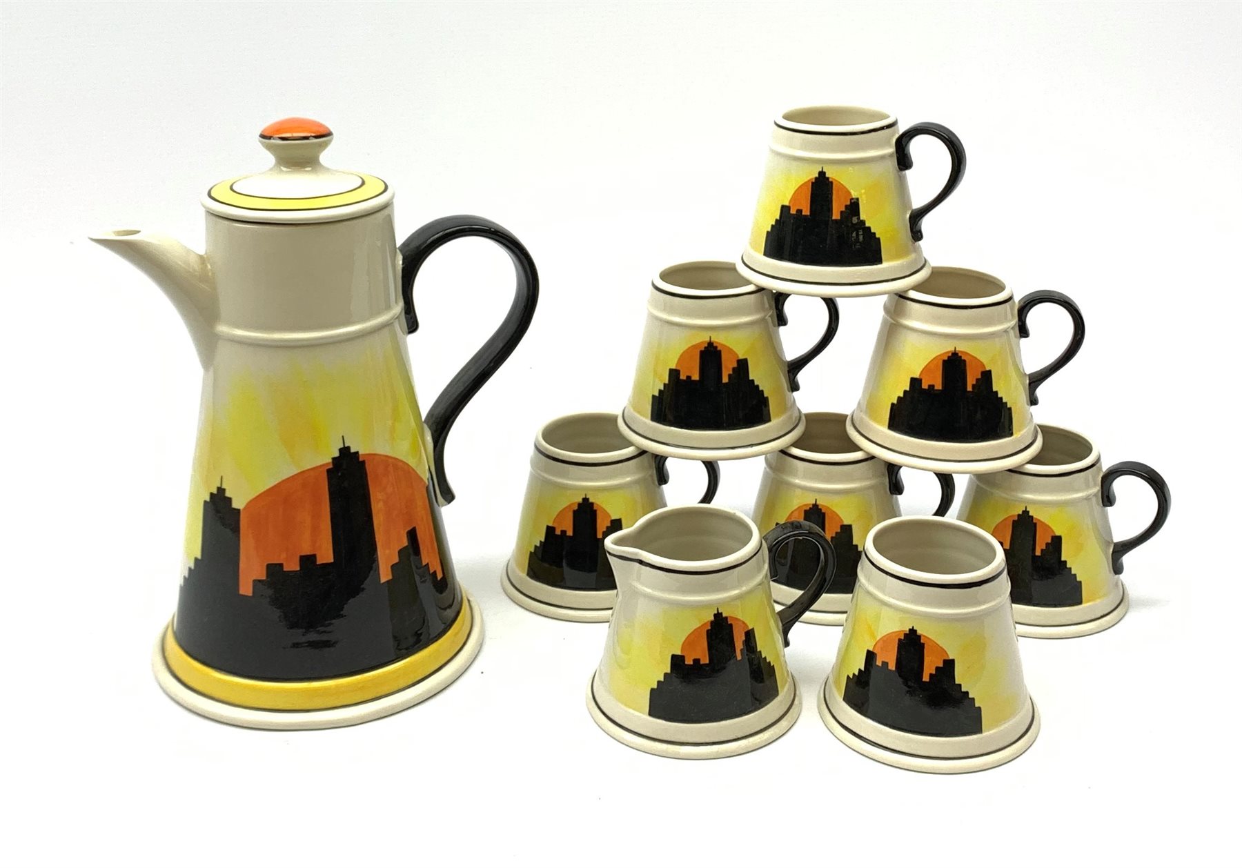 A Carlton Ware Art Deco style coffee set, decorated in the 'Manhatton Sunset' pattern, comprising coffee pot, milk jug, open sucrier, and six coffee cans, all of tapering form, coffee pot H26.5cm. 