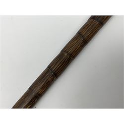 Edwardian novelty walking stick, the bamboo cane with silver mounted handle engraved with initial, concealing a vesta case with external striker, hallmarked London, probably 1908, makers mark worn and indistinct, H92cm