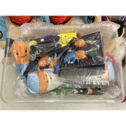 Three large ALDI Kevin carrots and giant unicorn stuffed toy together with quantity of smaller carrots