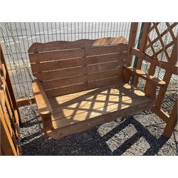 Timber garden arbour with rocking bench - THIS LOT IS TO BE COLLECTED BY APPOINTMENT FROM DUGGLEBY STORAGE, GREAT HILL, EASTFIELD, SCARBOROUGH, YO11 3TX