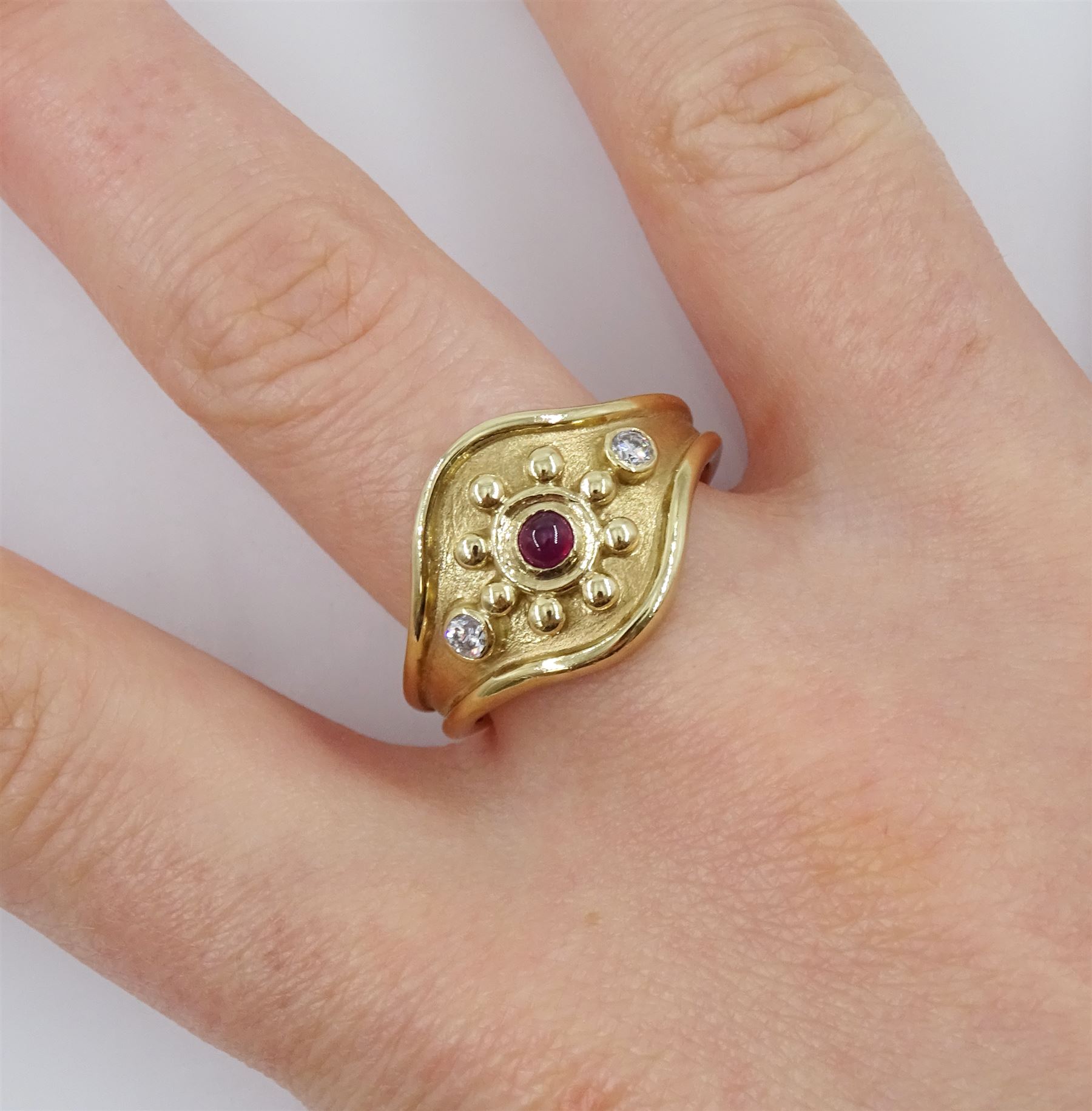 9ct gold three stone cabochon ruby and round brilliant cut diamond ring, Sheffield 1996