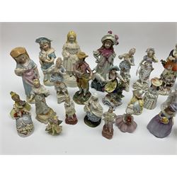 Various continental style porcelain figures to include Victorian examples and others, including figures modelled as fruit pickers, girl with cat, and other ceramic figures in one box