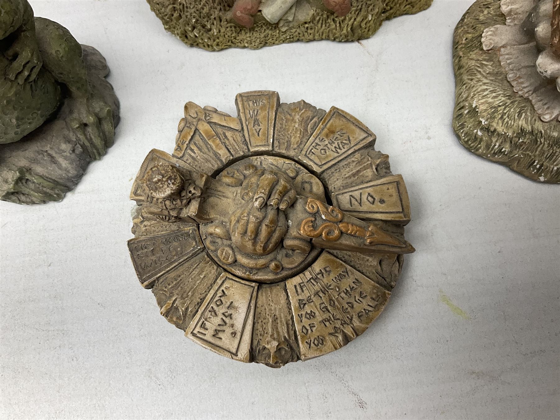 Seven Terry Pratchett Discworld figures by Clarecraft, to include The Luggage DW04M Smugli D990, pair of Home Sweet Home bookends, wall hanging modelled as a dragon upon stone plinth etc, tallest H19cm