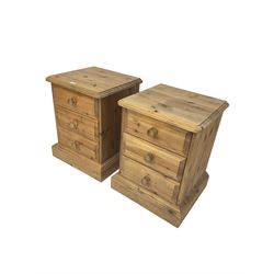 Pair pine bedside chests, square top over three drawers, on plinth base