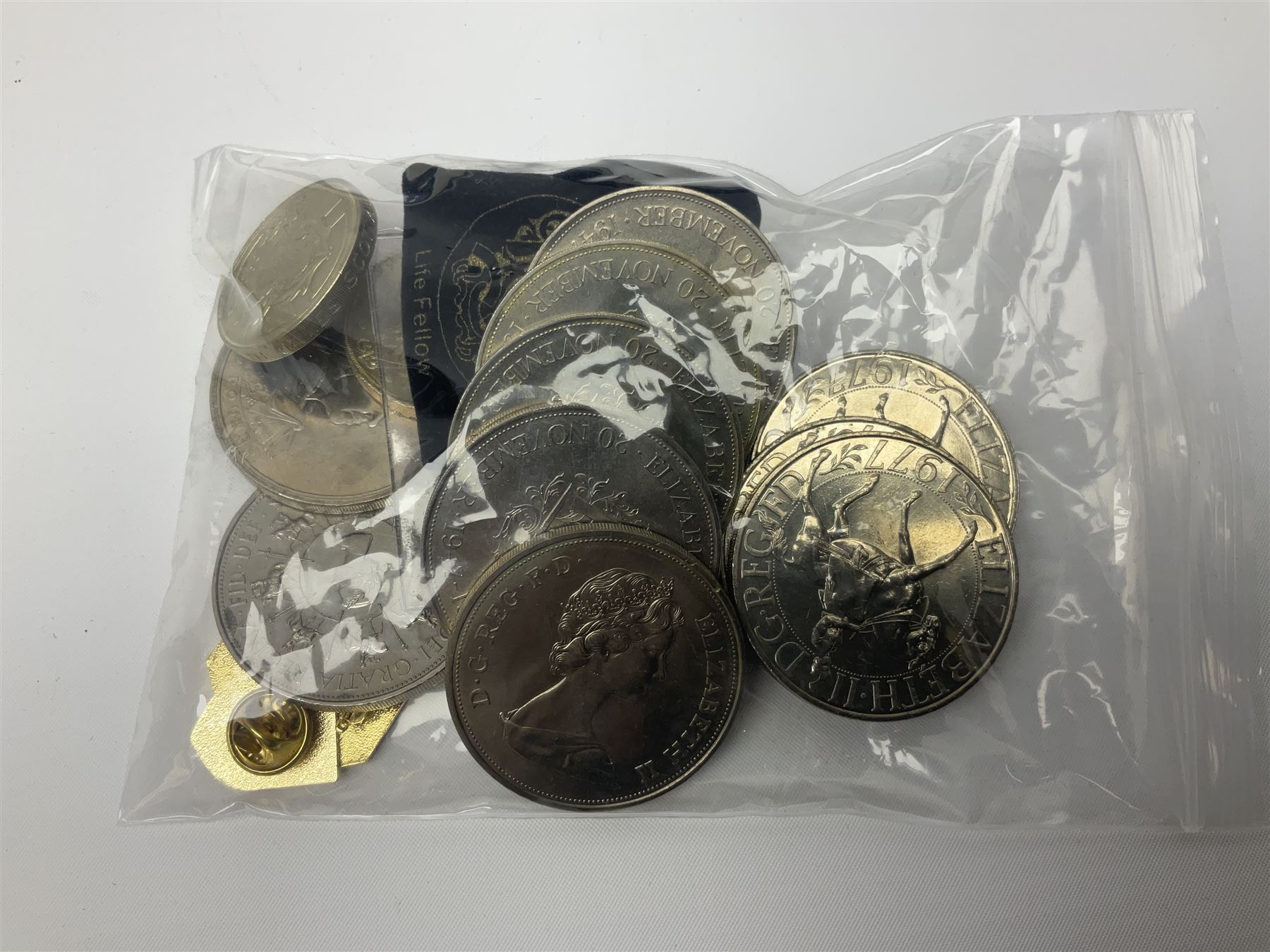 The Royal Mint United Kingdom 'Millennium' silver proof two coin set comprising 1999 and 2000 five pound coins, 2000 'The Queen Mother Centenary Year' silver proof crown, 2001silver proof one pound, 'Her Majesty The Queen Golden Jubilee 1952-2002' silver proof 2002 five pound coin and ten pound banknote set, all being cased with certificates, United Kingdom 1999 brilliant uncirculated coin collection in card folder, other commemorative coinage etc