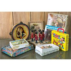 Collection of vintage children's toys, including Walt Disney picture cubes, a set of paint...