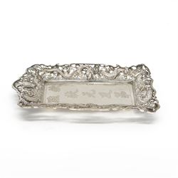 Chinese export pin tray, of rectangular form, the pierced sides embossed with dragons amongst flowers, stamped with character marks and maker's mark for Hungchong & Co, L13cm 