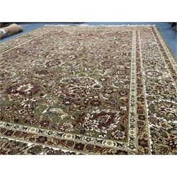 Persian design green ground carpet, central medallion with repeating border