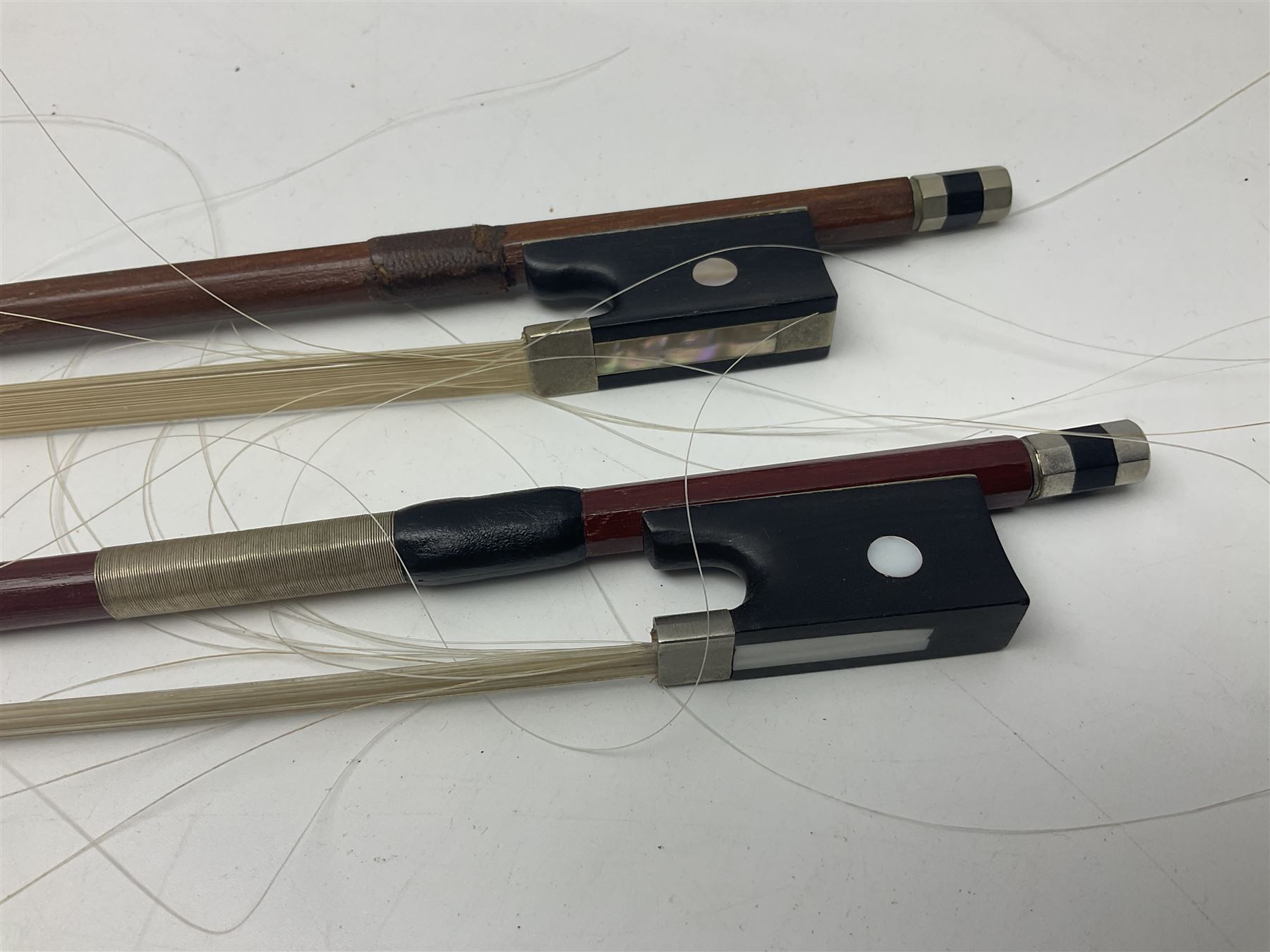 German half-size cello with 69cm two-piece maple back and ribs and spruce top; L112.5cm overall; in soft carrying case with two bows