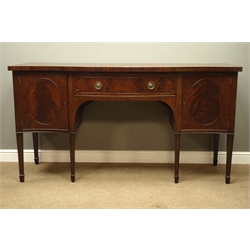  Early 20th century mahogany serpentine sideboard, fitted with centre drawer and two cupboards, W184cm, D62cm, H97cm  