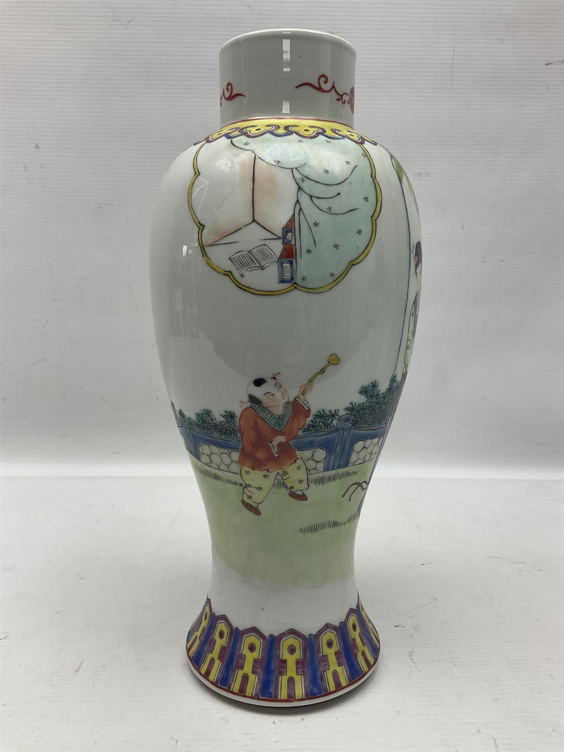 Chinese Famille Rose vase of slender baluster form, decorated with figures, H31cm  