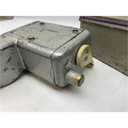 Bell Punch Company of London 'The Ultimate' five lever fare collection machine, together with an Almex ticket machine with shoulder strap, two brass Halifax transport cap badges, other chrome tramway cap badges, etc