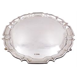 1920's silver salver, of circular form with pie crust rim, upon three hoof feet, hallmarked Sheffield 1925, D31cm, approximate weight 31.82 ozt (989.8 grams)