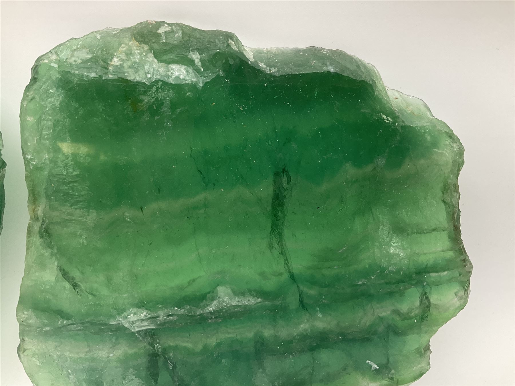 Pair of green fluorite slices, polished with rough edges, H16cm, L17cm  