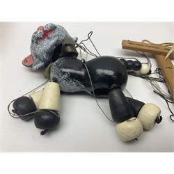 Pelham Puppet - three puppets comprising a painted wooden duck with felt mouth and wings with metal joints H12cm, in original box and instructions; and two further examples Type A cat with a hollow body H12cm, and a boy H23cm (3) 