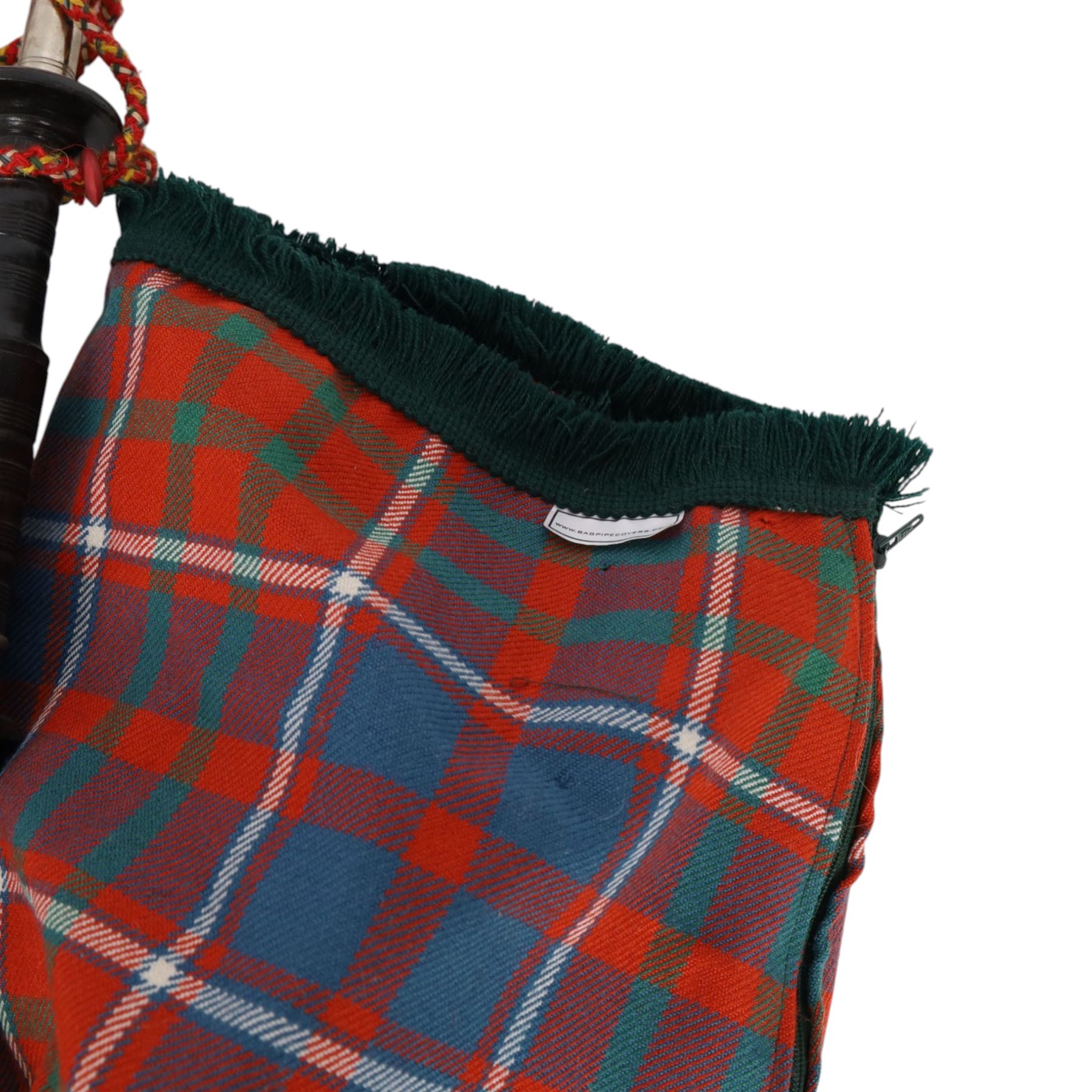 Set of ebonised wooden bagpipes, with new bag in Cameron of Lochiel tartan, contained in leather suitcase with initials PAJ to cover