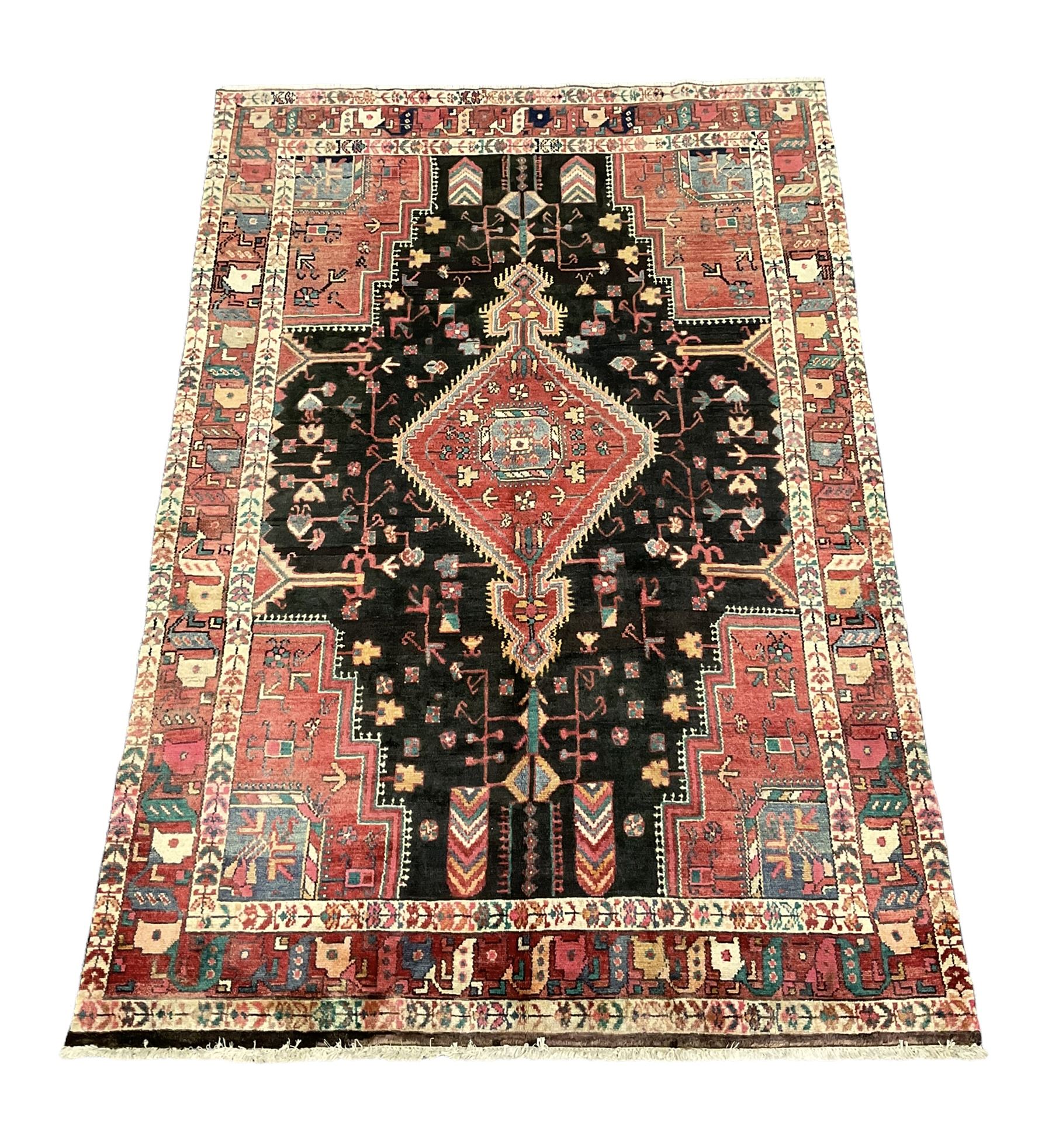 Persian Hamadan rug, the field decorated allover with stylised plant