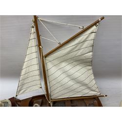 Nautical themed decorative items, to include Titanic book ends, model boat, books, lighthouse lamp etc in one box