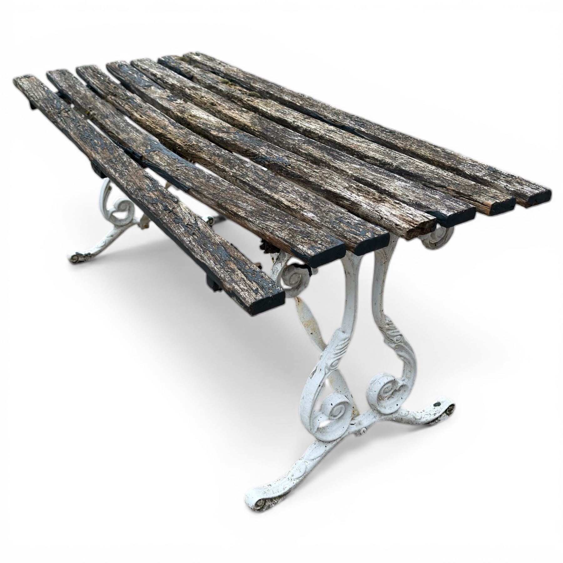 White painted cast iron slatted garden bench with 110cm wide rectangular coffee table