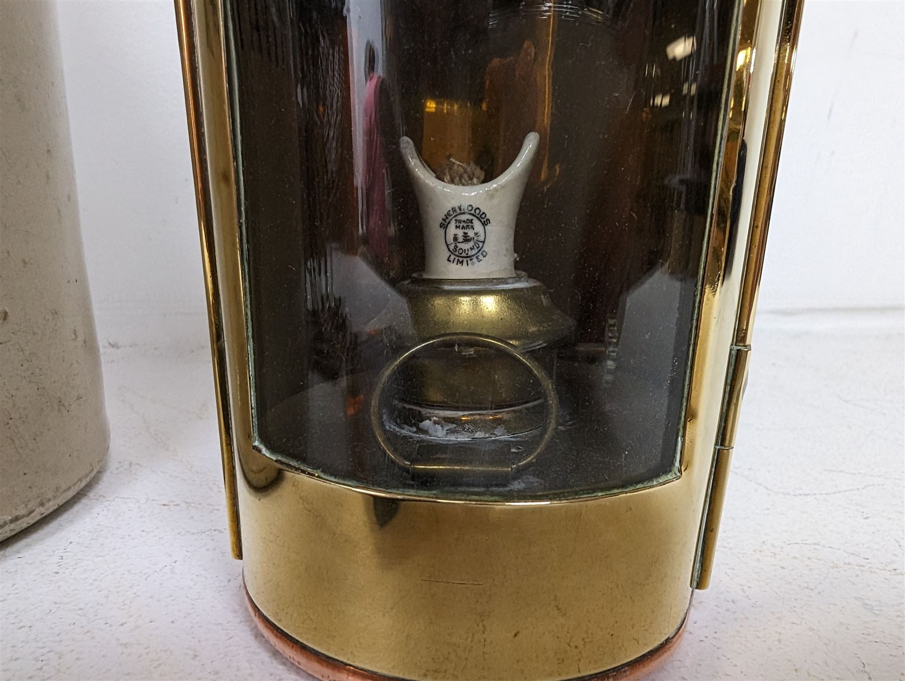 Watt & Ferguson Botanical Brewers stoneware flagon, together with a Sherwoods copper and brass lamp and a Koilos Minimal plate camera, flagon H26.5cm